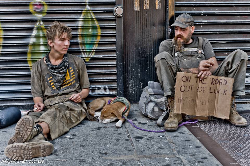 Two homeless men looking for a hand-out.